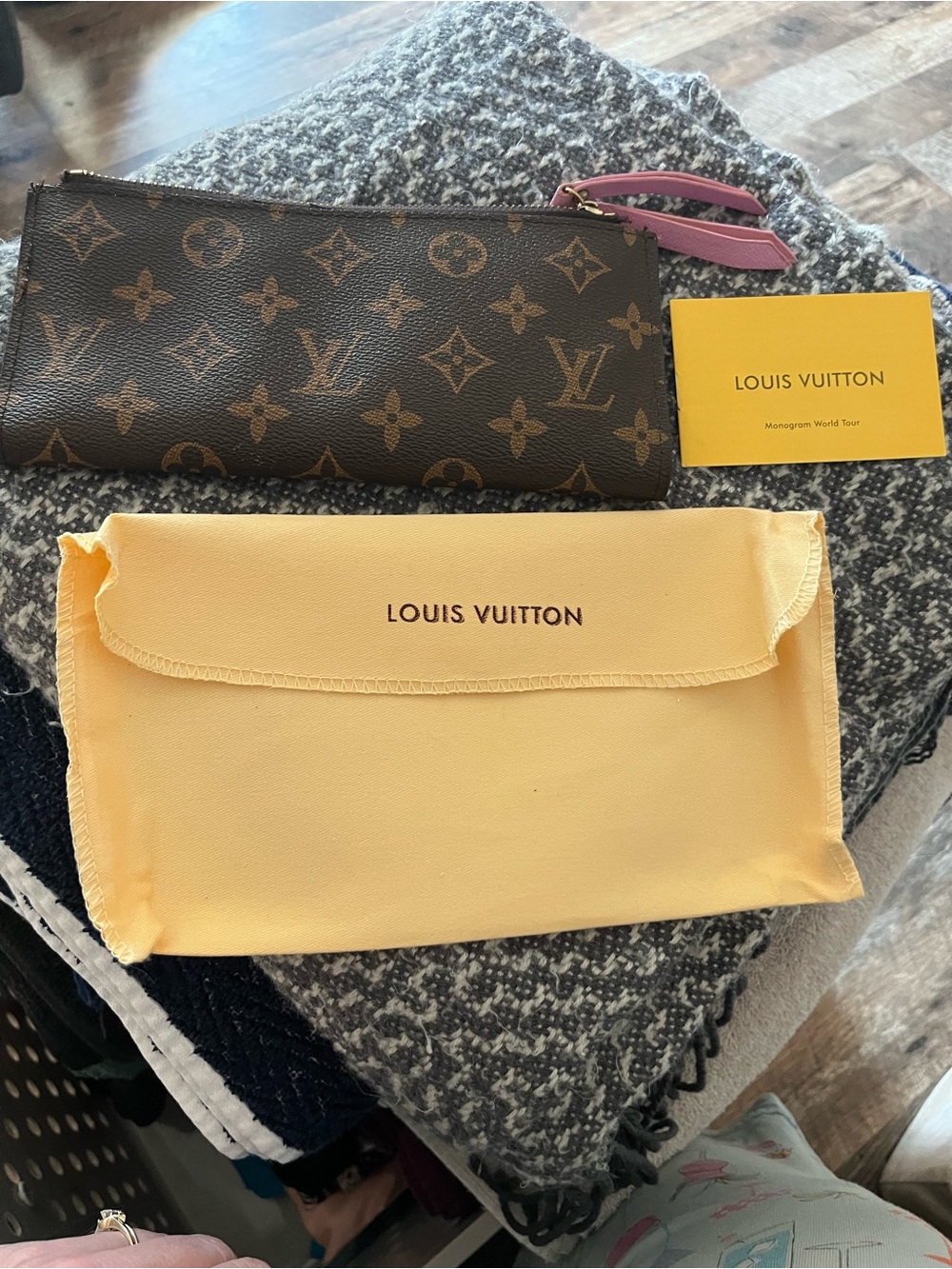 Louis Vuitton Monogram Canvas Clutch with Pink Pull